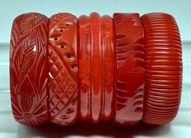 BB313 red carved bakelite bangles